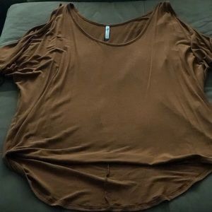 Burnt orange shoulder cut out top.